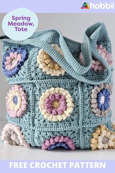 a crocheted bag with flowers on it and the words spring meadow tote