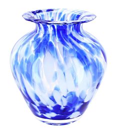 a blue and white vase sitting on top of a table