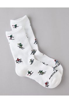 Made from soft cotton/Ribbed cuff/Holiday-inspired pattern Cotton Socks With Ribbed Cuffs, White Casual Socks With Ribbed Cuffs, Casual White Socks With Ribbed Cuffs, Casual Cotton Socks For Winter, Cozy White Cotton Socks, Playful White Winter Socks, Winter Cotton Socks With Ribbed Cuffs, Crew Socks, American Eagle Outfitters