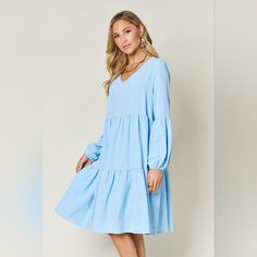 Features: Tiered Sheer: Opaque Stretch: No Stretch Body: Not Lined Material Composition: 100% High Stretch Yarn Care Instructions: Machine Wash Cold. Tumble Dry Low. Imported Product Measurements: S:Length 36.61 In, Bust 38.58 In M:Length 37.20 In, Bust 40.94 In L:Length 37.80 In, Bust 43.31 In Xl:Length 38.39 In, Bust 45.67 In 2xl:Length 38.98 In, Bust 49.61 In 3xl:Length 39.57 In, Bust 53.54 In Blue Long Sleeve V-neck Dress For Spring, Casual Blue Flowy V-neck Dress, Blue Midi-length V-neck Dress For Spring, Flowy Light Blue Long Sleeve Mini Dress, Light Blue Long Sleeve Midi Dress For Brunch, Light Blue Flowy V-neck Midi Dress, Blue Long Sleeve V-neck Dress For Vacation, Blue Flowy V-neck Casual Dress, Blue V-neck Dress For Spring Brunch