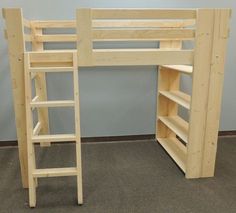 a wooden bunk bed next to a ladder