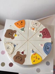 there is a cake decorated with different animals on it