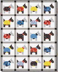 a quilt pattern with dogs in sweaters on it