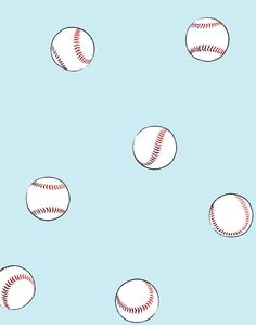 several baseballs are flying through the air on a brown and tan background with white dots