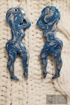 Blue and gray swirls silhouette  earrings. In 3 inches, double sided Silhouette Earring, Jewelry Earrings Dangle, Double Sided, Dangle Drop Earrings, Dangle Earrings, Jewelry Earrings, Ships, Drop Earrings, Blue