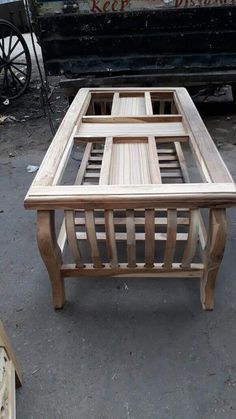 a coffee table made out of wooden slats