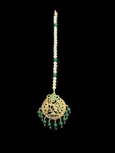 ready  to ship tika  made using shell pearls , cz polki and beads with 22ct gold plating  delivered in 3-5 days within USA Green Cutdana Jewelry For Eid, Green Kundan Tikka For Eid, Green Jewelry With Zari Work For Eid, Green Hand Set Round Chandbalis, Ceremonial Green Kundan Necklace, Festive Green Meenakari Tikka, Green Tikka For Eid Gift, Bollywood Style Green Tikka For Diwali, Traditional Green Tikka For Diwali