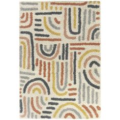 a rug with an abstract design on the front and back of it, in various colors