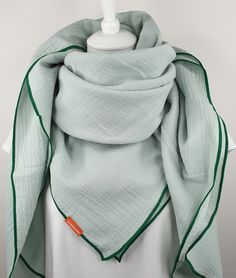 "The muslin scarf mint gives your outfit lightness. Color: mint Hem Color: chlorophyll Size and Weight: 51 x 51\", 8.1 oz (130 x 130 cm, 230 grams) 26 x 26\", 2.3 oz (65 x 65 cm, 56 grams) Type of fabric: Muslin 100% organic Cotton Care instructions: Delicate cycle, best in the laundry net" Casual Green Cotton Scarves, Spring Green Cotton Scarves, Green Cotton Scarves For Spring, Pastel Couture, Double Gaze, Double Gauze, Scarf Wrap, Scarf Accessory, Care Instructions