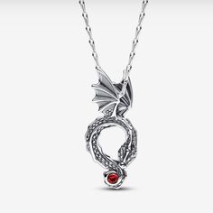 Pandora Game Of Thrones Dragon Pendant Necklace New. 17.7 Inches S925 Sterling Silver Face The Elements With The Game Of Thrones Dragon Pendant Necklace. Made Of Sterling Silver, This Adjustable-Length Necklace's Pendant Portrays A Game Of Thrones Dragon Curled Up With Its Wings Spread And Tail Wrapped Around A Red Man-Made Crystal. Another Red Crystal Sparkles From The End Of The Pendant Necklace Chain. Wear This Dragon Pendant As A Symbol The Great And Powerful Mysteries Of The World Both Fict Mysteries Of The World, A Game Of Thrones, Game Of Thrones Dragons, Pandora Silver, Dragon Pendant, Red Crystals, Pandora Jewelry, Necklace Chain, Chains Necklace