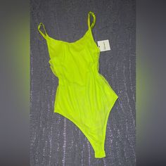 Never Worn Bodysuit. Purchased This 3 Years Ago While On Vacation. I Purchased A Similar Bodysuit After This One And Never Got The Chance To Wear This One. Bodysuit Comes In A Size X-Small. Yellow Bodysuit, Bustier Bodysuit, Brown Bodysuit, Embroidered Bodysuit, Free People Bodysuit, Strapless Bodysuit, Green Bodysuit, Backless Bodysuit, Cami Bodysuit