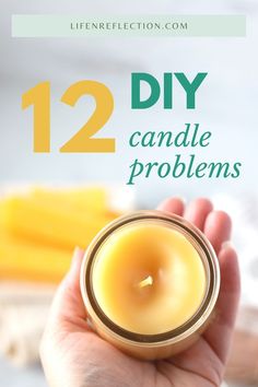 someone holding a candle in their hand with the words 12 diy candle problems on it