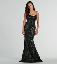 Indulge in luxury and sparkle in the Carly sequin satin formal dress at galas or black-tie soirees! The square neckline and flexible boning create a stunning silhouette, while adjustable spaghetti straps and a lace-up back provide a perfect fit. The flared floor-length hem with a mermaid silhouette adds a touch of elegance, complemented by the intricate sequin scroll pattern on lustrious satin fabric. Style the formal gown with elegant earrings and a clutch for an unforgettable evening look.Fit Long Black Hoco Dress, Elegant Contrast Sequin Prom Dress, Elegant Contrast Sequin Dress For Prom, Elegant Evening Dress With Contrast Sequin For Prom, Gala Formal Evening Dress With Contrast Sequin, Formal Gala Evening Dress With Contrast Sequin, Formal Evening Dress With Contrast Sequin For Gala, Black Gown With Contrast Sequin For Evening, Black Mermaid Dress For Prom Party Season