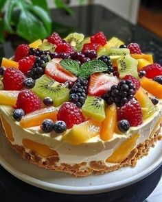 there is a cake with fruit on it