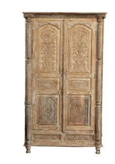 an old wooden armoire with carvings on the front and side panels, isolated against a white background