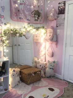 there are many stuffed animals in the room with pink walls and decorations on the wall