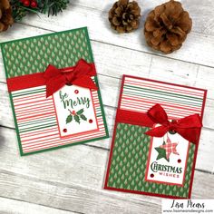 two christmas cards with bows and pine cones