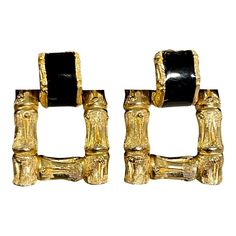 Gold plated faux bamboo earrings with a swath of black enamel. Signed David Hill on back. Clip back style. Black Enamel Metal Earrings For Evening, Black Enamel Earrings, Pierced, Black Enamel Pierced Earrings, David Hill, Palm Beach Chic, Bamboo Earrings, Beach Chic, Faux Bamboo, Black Enamel