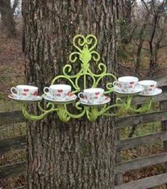 an image of a tree with tea cups on it