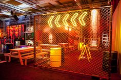 the interior of a restaurant with neon lights