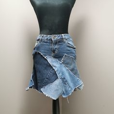 "Upcycled denim patchwork skirt with frayed seams. Waist measures 30\" and length is approximately 16\"." Denim Skirt Made From Jeans, Jean Skirt Outfits 2023, Patchwork Skirt Denim, Upcycle Jeans Skirt, Repurpose Denim, Upcycle Denim Jeans, Jean Refashion, Upcycled Denim Skirt, Diy Denim Skirt