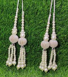 Indian Handmade White Pearl Latkan for Saree Blouse Lehenga HandBags Dupatta Decoration Bridal Wedding dress for Women pair of 2 pcs Size - 17.0 cm Length  Item Description You can use this Beautiful pair of tassle for several DIY projects.  *These beautiful Tassel Latkans are used as the accessory for saree blouse on the back, but u can use according to your need and your innovative ideas. * Package contains 2 Latkan / 1 Pair Other Than Saree Blouse, you can use these latkans in various ways Craft Projects Designing Home Decoration Festive celebrations. Evening and party Apparels. Home décor items Apparel & Fashion Scarves n Stoles Headband, hats Table cover, curtains, Pillow covers, Cushion cover Shoe designing Headband, hats Table cover, curtains Designing stylish blouses Ship From New Wedding Dress For Women, Blouse Lehenga, Stylish Blouses, Bridal Wedding Dress, Fashion Scarves, Innovative Ideas, 16 29, Stylish Blouse, Bridal Wedding Dresses