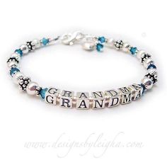 "This birthstone bracelet for Grandma or Grammie is made with alphabet block letters with kids' or grandkids' names. The bracelet with the kid's (or grandkid's) names is sometimes called a Mother's Birthstone Bracelet but whatever you call it - it is a fun gift to give yourself or someone you love to show off their kid's or grandkid's. Some of the Name Bracelets are shown with add-on charms. This bracelet starts at $49 (.925 sterling silver and Swarovski) without charms or dangles. We have 100's Personalized Sterling Silver Jewelry With Round Beads, Personalized Sterling Silver Beaded Bracelets As Gift, Personalized Round Beaded Jewelry For Anniversary, Personalized Round Beads Jewelry For Anniversary, Anniversary Sterling Silver Jewelry With Letter Beads, Personalized Round Bead Jewelry For Anniversary, Personalized Spiritual Beaded Bracelets For Birthday Gift, Birthday Bracelets With Name On Round Beads, Silver Beaded Name Bracelets For Birthday