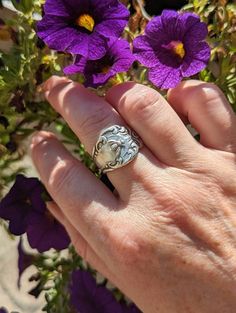 A beautiful plated Silver Spoon ring that is easily adjustable to your finger size.   The face of the band is adorned with a tiny Bee charm. If you prefer the ring without the Bee, you can select "no bee" in the drop-down menu.  This Boho ring is a trendy statement piece that has cottage core vibes and goes with everything. A fab gift idea for someone who loves the beauty of carefree, Bohemian jewelry.  SIZE: This is an adjustable ring! So easy to resize by gently pulling the sides of the shank Small Business Gifts, Silver Spoon Ring, Jewelry Board, Bee Jewelry, Vintage Inspired Jewelry, Spoon Ring, Thumb Ring, Bee Earrings, Spoon Rings