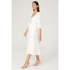 White cotton blend (96% Organic Cotton, 4% Spandex). A-line. 3/4 sleeves. Sweetheart. Imported. Chic Cotton Half Sleeve Dress, Chic Half Sleeve Cotton Dress, Chic Cotton Dress With Half Sleeves, Spring Midi Dress Fitted, White Long Sleeve Fit And Flare Midi Dress, White Fit And Flare Long Sleeve Midi Dress, Elegant Cotton Dresses With 3/4 Sleeve, White Midi Dress With 3/4 Sleeves For Brunch, Feminine Midi Dress With 3/4 Sleeves