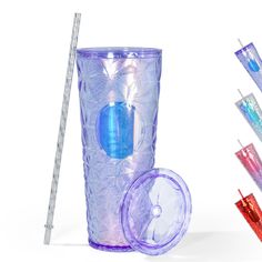 a plastic cup with some straws in it next to a toothbrush holder and other items