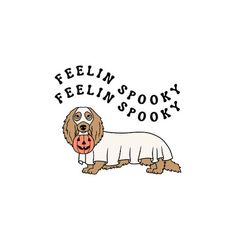 a dog wearing a sweater with the words feelin'spooky on it