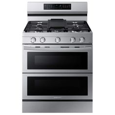 two ovens side by side on a white background