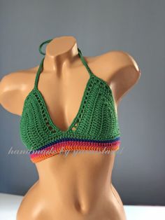 "If you want to see my other handmade bikini and pareos; https://www.etsy.com/shop/yarnisland?ref=seller-platform-mcnav&section_id=28064187 Handmade with 100% high quality cotton yarn. Indispensable for summer fashion and festivals, great crochet top. You can make great combinations with your shorts and jeans. Its material is very strong and is knit frequently for minimal transparency. Color; Green SIZING: If you are not sure which size to choose for your size, please choose from the size ch Festival Crochet Stretch Swimwear, Bohemian Multicolor Crochet Swimwear, Handmade Multicolor Swimwear For Beach, Handmade Multicolor Beach Swimwear, Bohemian Crochet Fitted Swimwear, Bohemian Fitted Crochet Swimwear, Handmade Fitted Triangle Crochet Top, Handmade Fitted Crochet Triangle Top, Fitted Bohemian Swimwear With Crochet Trim