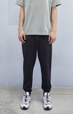 PacSun Exclusive! The Comfort Performance Jogger Sweatpants from A.R.C. Activewear by PacSun are part of our Comfort Series, crafted with soft fabrics ideal for lounging yet designed for optimal performance. Featuring 4-way stretch, an elasticated waistband, hidden zip pockets, and a reflective exposed ticked drawcord with rubber tips, these joggers provide high recovery and flexibility, perfect for both relaxation and activity.


	Performance sweatpants
	Reflective drawcord
	Elasticated waistline
	4-Way stretch
	Single zip pocket
	Key loop detail
	High recovery
	88% Polyester, 12% spandex
	11" Leg opening
	27" Inseam
	Measurements taken from size medium
	Machine washable
	Model is wearing size medium
	Model Measurements: 6'1” Height, 34.5” Chest, 29" Waist Casual Activewear With Elastic Waistband And Straight Hem, Casual Activewear With Elastic Waistband, Leisure Pants With Elastic Waistband And Straight Hem, Stretch Straight Leg Joggers For Leisure, Casual Joggers With Straight Hem For Lounging, Leisure Straight Leg Stretch Joggers, Casual Joggers For Lounging With Straight Hem, Casual Activewear With Straight Hem, Relaxed Joggers With Straight Hem For Leisure