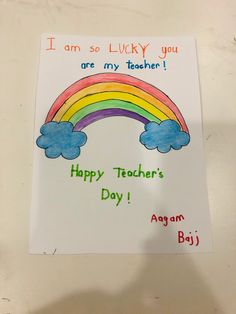 a hand holding up a card that says, i am so lucky you are my teacher's day