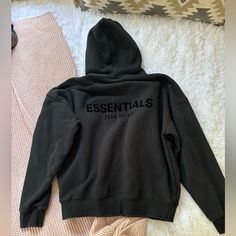 Black Slightly Used But In Good Condition No Rips Or Stains Cozy Black Hoodie For Fall, Cozy Black Sweatshirt For Streetwear, Essential Winter Hooded Hoodie, Winter Essential Hooded Hoodie, Essential Fall Hoodie Sweatshirt, Essential Winter Streetwear Sweatshirt, Essential Hooded Winter Sweatshirt, Essential Long Sleeve Winter Sweatshirt, Black Everyday Hoodie Top