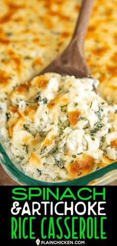 spinach and artichoke rice casserole in a glass dish with a wooden spoon