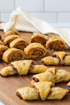 several pastries on a wooden cutting board