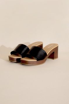 A contemporary and sophisticated addition to your footwear collection. These mules feature a sculptural block heel and platform design that effortlessly blends modern style with comfort. The slide-on style ensures easy wear, while the unique heel adds a touch of artistic flair to your look. Toe: Open toe, round Heel shape: Block heel Material: Synthetic Imported Heel Height: 2.8" Care Instructions: Use a soft cloth and a little lukewarm water to clean the footwear after use. If necessary, add a Mules With Socks, Thrifted Style, Fall Sneakers, Unique Heels, Mule Heels, Platform Design, Platform Mules, China Style, Platform Block Heels