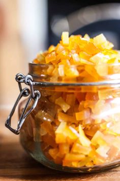 a glass jar filled with chopped up food