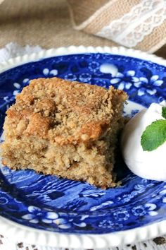 a piece of cake on a blue and white plate