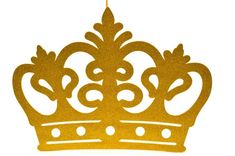 a gold crown ornament hanging from a string