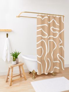 a bathroom with a bathtub, stool and shower curtain in it's corner