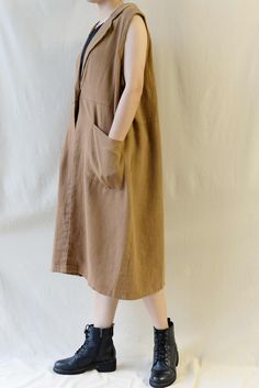 "❤Size: one size Length:103cm(40.6\") Bust:122cm(48\") ❤Material: 100% Linen ❤Color: Brown, Coffee, Dark Gray, Burgundy, Black, Original hemp color. ❤ Season : Spring, Summer, Autumn, Winter. ❤For custom size, i need some measurements as following: Bust? Waist? Hips? Height? Dear Customers Welcome to ohyeahrock,we are a entrepreneurial team for making fashion party garments. Graduated from Shanghai Institute of Design, 100% handmade and we can offer a variety of different styles of fabric for yo Brown Relaxed Fit Outerwear For Summer, Sleeveless Beige Outerwear With Pockets, Casual Oversized Sleeveless Outerwear, Oversized Sleeveless Casual Outerwear, Beige Sleeveless Outerwear With Pockets, Casual Beige Vest With Pockets, Casual Sleeveless Outerwear With Pockets, Casual Sleeveless Vest With Side Pockets, Brown Summer Workwear Vest