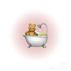 a brown teddy bear sitting in a bathtub filled with bubbles