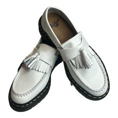 Dr.Martens Adrian Ys Smooth White 27431100 Leather Tassle Loafer Size W 8/ M 7 Dr. Martens Adrian Ys Smooth White Leather Tassel Loafers Are A Comfortable And Stylish Choice For Men's Casual And Activewear. These Pull-On Loafers Feature A Round Toe Shape And Rubber Outsole For Durability And Comfort. The Leather Upper And Lining Material Add A Touch Of Luxury To The Design. The Tasseled Accents And Solid Pattern Make Them Perfect For Going Out. Available In Us Size 8, Uk Size 7, And Eu Size 39, White Leather Tassel Loafers With Rubber Sole, White Leather Classic Tassel Loafers, Classic White Leather Tassel Loafers, White Slip-on Tassel Loafers For Formal Occasions, White Tassel Loafers With Rubber Sole For Formal Occasions, White Tassel Loafers With Brogue Detailing For Formal Occasions, White Tassel Loafers With Leather Sole And Round Toe, White Leather Tassel Loafers For Spring, White Leather Loafers With Tassels