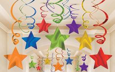 multicolored stars and swirls hanging from the ceiling