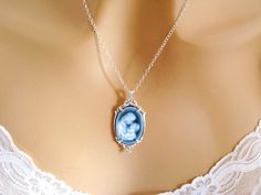 "Real Cameo Necklace, New Mom Gift, Mother and Child Cameo Necklace Sterling Silver Carved Agate, Blue Cameo Necklace, Cameo Jewelry Jewellery I love the sweetness in this beautiful genuine carved agate Victorian Mother/Child cameo necklace. The pendant is a neoclassical woman and child against a blue background. This is the real thing - carved from agate stone, and is framed in sterling silver hanging on a sterling silver chain. Length: your choice - 16 to 30 inches Pendant: 1.38 inches (18 x 1 Blue Cameo Necklace For Wedding, Blue Cameo Jewelry For Wedding, Blue Cameo Jewelry For Formal Occasions, Formal Blue Cameo Jewelry, Blue Cameo Necklace For Formal Occasions, Victorian Mother, Carved Agate, Mother Child, Cameo Jewelry