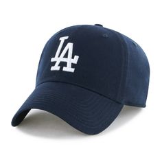 This Los Angeles Dodgers Baseball Hat – Navy is a perfect blend of style and comfort. Features a navy blue color with ‘LA’ written on it that goes well with most outfits. With an adjustable back tuck and side strap for a customizable fit, it is more than just a hat, it's your go to accessory. Whether it’s an outing with friends or a weekend trip, rock this hat the way you like. La Dodgers Outfit, La Baseball Cap, Dodgers Outfit, La Dodgers Hat, Dodgers Hat, Ny Hat, Dodger Hats, Back Tuck, Los Angeles Shopping