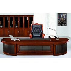 an executive office desk with leather chair and bookcases